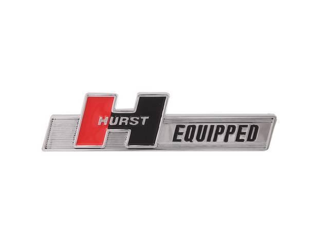 EMBLEM, Hurst Equipped, ABS Plastic, Die Cast Zinc Chrome Design, Attaches w/ 3M adhesive backed tape, Dimensions are 5-1/4 inch width x 1-1/4 inch height, Repro